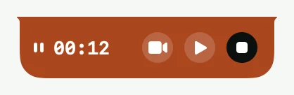 The Recording Island while paused, filled orange with a resume button.